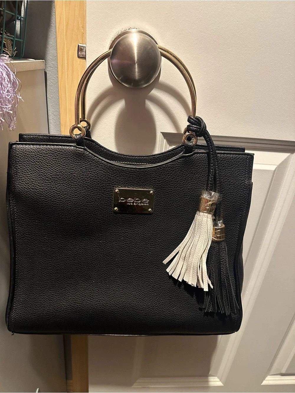 bebe Black Handbag with White & Black Tassels